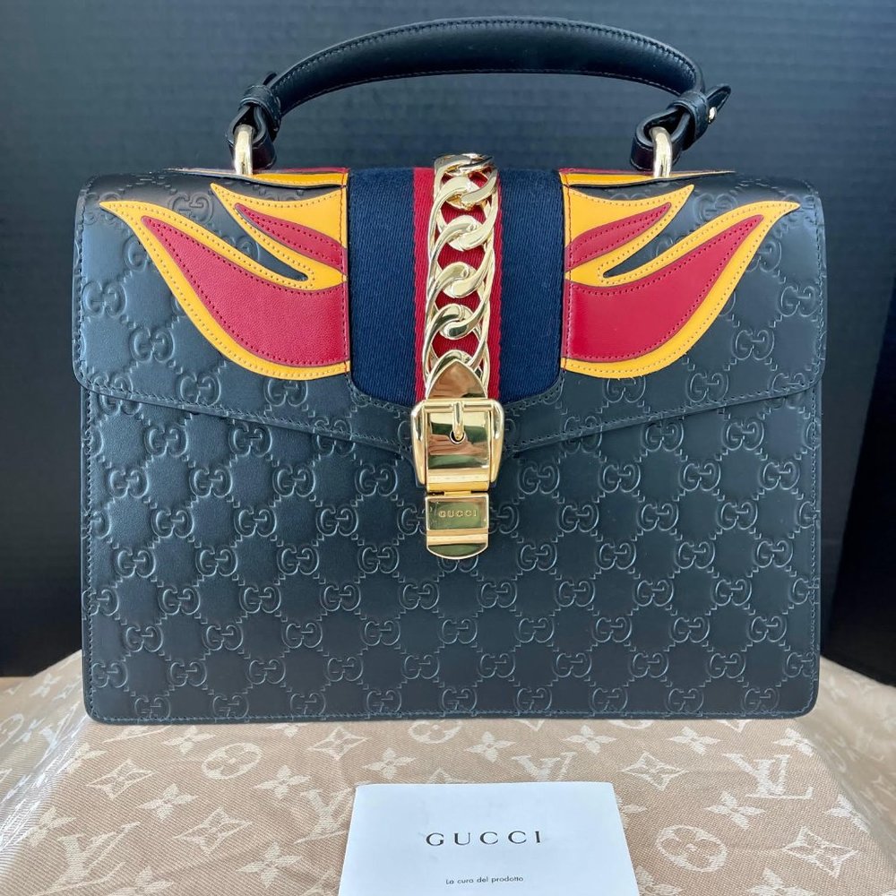 Gucci Top Handle Sylvie 1969 Flame Edition GG motif Embossed